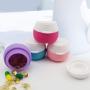 Beaupretty 4pcs Silicone Cream Jars Small Travel Comestic Containers Leakproof Toiletry Cases with Hard Sealed Lids for Face Hand Body Cream (Red, Purple, Blue, Pink Each One)