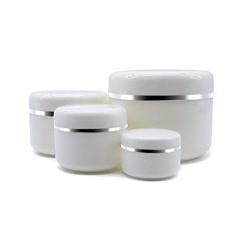 An empty white silver-rimmed portable refillable plastic cosmetic cosmetic cream jar with lining and dome cover. Sample container bottle jar 4 pieces (250ml 100ml 50ml 20ml)