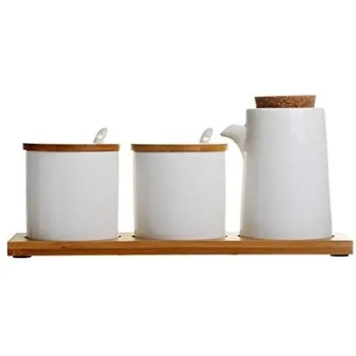 LQQGXLCondiment bottle, jar condiment storage box Spice jar white, ceramic sugar jar with lid, condiment jar, seasoning box set with lid spoon and tray 翻译：

LQQGXL Gewürzflasche, Glaskaraffe, Gewürzebehälter weiß, Keramik-Zuckerglase mit Deckel, Gewürzbeh
