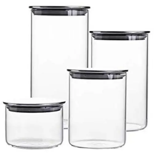 Ensemble de 4 bocaux en verre transparent avec couvercles en acier inoxydable hermétiques.