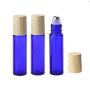 3PCS 10ml/0.34oz Empty Refillable Blue Glass Roll-on Bottles with Stainless Steel Roller Balls Wood Grain Cap Portable Cosmetic Containers Jar Pot Vials Holder for Essential Oil Perfume