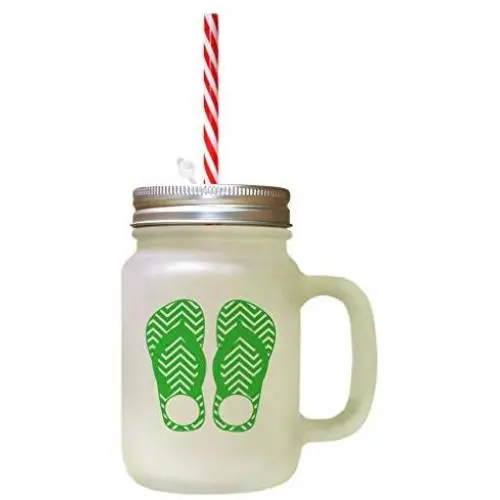 Image d'un Slipper (ou slip) Vert dans une Jarre en Verre Froissée avec une Paille. Image d'un Slipper (ou slip) Vert dans une Jarre en Verre Froissée avec une Paille.