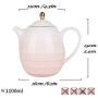 Voici une traduction possible :

Bouilloire Céramique Vintage 1100ml, Grand Volume, Filtre Inox, Jar de Stockage d'Eau, Culture du Thé Chinoise, Thé Jasmin Vert, Thé Noir, Café, Lait, Salon, Amoureux du Thé, Rose.