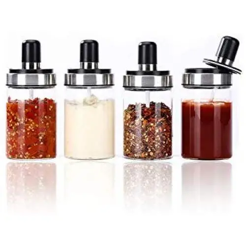Bouteilles de stockage de condiment en verre avec cuillère doseuse pour épices, poivre, ketchup, 1 pièce. Bouteilles de stockage de condiment en verre avec cuillère doseuse pour épices, poivre, ketchup, 1 pièce.