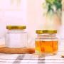 Small Mason Jars,Woaiwo-q 1.5oz Small Glass Jars Mini Honey Jars Clear Hexagon Jars with Lids(Gold,25Pack)