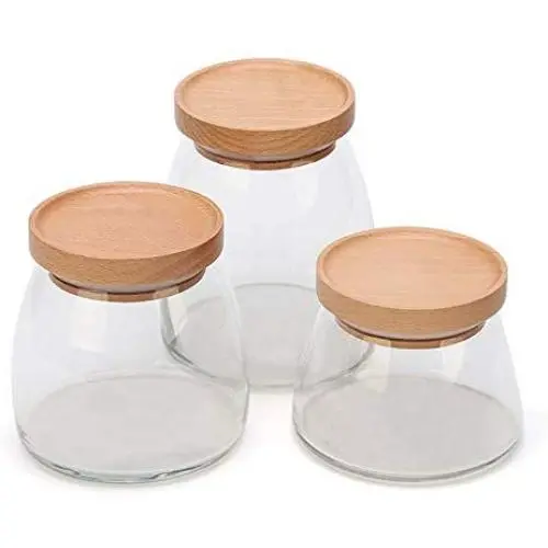 Bouteilles en verre scellées, Réserves de grains pour la cuisine et la maison, Un ensemble de 3. Bouteilles en verre scellées, Réserves de grains pour la cuisine et la maison, Un ensemble de 3.