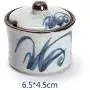 Bouteille de rangement japonaise pour sucre/sel/poivre peinte à la main en céramique avec couvercle. Bouteille de rangement japonaise pour sucre/sel/poivre peinte à la main en céramique avec couvercle.