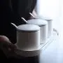 Contenants de stockage des épices, petits pots en porcelaine, contenants de condiments, pots d'épices en gros. Contenants de stockage des épices, petits pots en porcelaine, contenants de condiments, pots d'épices en gros.