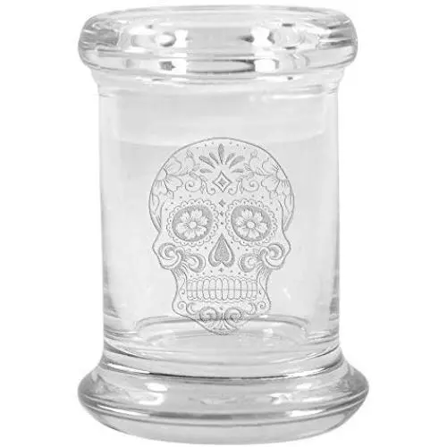 Clear Glass Herb Stash Jar and Lid 2.75 oz with Sugar Skull Logo from Smoke Promos Clear Glass Herb Stash Jar and Lid 2.75 oz with Sugar Skull Logo from Smoke Promos
