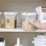 Household grain and miscellaneous grain storage tank, plastic storage tank, kitchen food sealed, beans and beans storage box, 4 squares Pink Household grain and miscellaneous grain storage tank, plastic storage tank, kitchen food sealed, beans and beans storage box, 4 squares Pink
