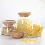 Bouteilles en verre scellées, Réserves de grains pour la cuisine et la maison, Un ensemble de 3. Bouteilles en verre scellées, Réserves de grains pour la cuisine et la maison, Un ensemble de 3.