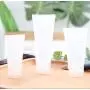 12 Stück 50 ml 1,7 oz Transparente Wiederbefüllbare Kosmetik Soft Tube Tragbare Squeeze Flasche mit Flip-Deckel für Gesichtsreiniger Lotion Creme Zahnpasta Proben Dosierflaschen für Reisen