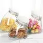 Bouteilles en verre étanches, contenants de stockage de grains, d'épices/avoine/haricots/café. Bouteilles en verre étanches, contenants de stockage de grains, d'épices/avoine/haricots/café.