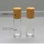 3 Bouteilles Transparentes de 10 ml (0,3 oz) avec Billes à Rouler en Acier Inoxydable et Couvercle en Bambou – Récipient Portable Réutilisable pour Voyage et Usage Quotidien 3 Bouteilles Transparentes de 10 ml (0,3 oz) avec Billes à Rouler en Acier Inoxydable et Couvercle en Bambou – Récipient Portable Réutilisable pour Voyage et Usage Quotidien