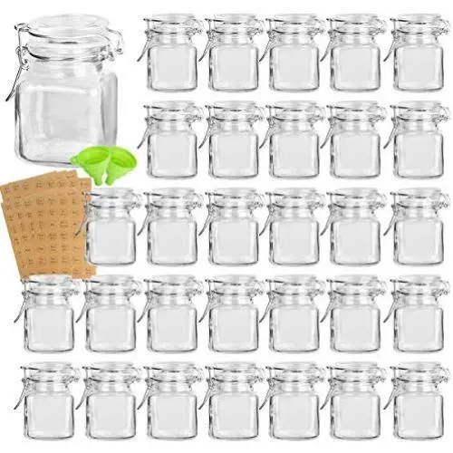 Bouteilles en Verre Spice Jars, LOT de 30 (3,5 oz) avec Joint en Caoutchouc Anti-Fuite et Couvercle Amovible, 280 Étiquettes pour Épices & 2 Pots de Silicone pour la Cuisine et les Créations Artisanales Bouteilles en Verre Spice Jars, LOT de 30 (3,5 oz) avec Joint en Caoutchouc Anti-Fuite et Couvercle Amovible, 280 Étiquettes pour Épices & 2 Pots de Silicone pour la Cuisine et les Créations Artisanales