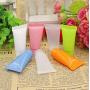 24Pcs 5 ml Plastic Cosmetics Squeeze Tube Refillable Mini Sample Bottle Container Jar Pot Case Holder for Cream Shower Gel Shampoo Facial Cleanser (Orange)