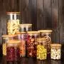 Bouteilles en verre borosilicate transparentes Isily avec couvercle en bambou et mécanisme de verrouillage, pour stockage alimentaire, cuisine, garde-manger, café, thé, biscuits, noix. Bouteilles en verre borosilicate transparentes Isily avec couvercle en bambou et mécanisme de verrouillage, pour stockage alimentaire, cuisine, garde-manger, café, thé, biscuits, noix.
