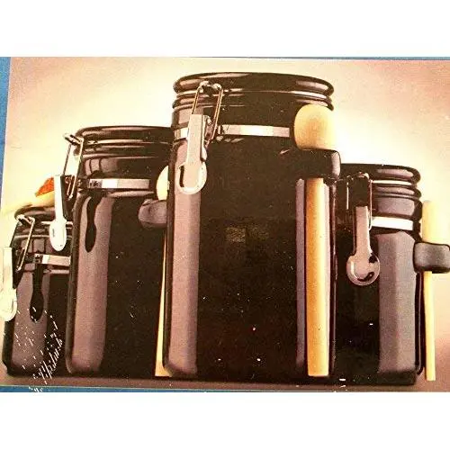 Ensemble de 4 bocaux noirs en céramique avec cuillères en bois Ensemble de 4 bocaux noirs en céramique avec cuillères en bois