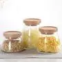 Bouteilles en verre scellées, Réserves de grains pour la cuisine et la maison, Un ensemble de 3. Bouteilles en verre scellées, Réserves de grains pour la cuisine et la maison, Un ensemble de 3.