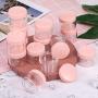 20 Pieces Round Pot Jars Plastic Cosmetic Containers Set with Lid for Liquid Creams Sample, 20 ml/ 0.7 oz (Pink Lid)