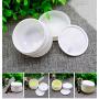 An empty white silver-rimmed portable refillable plastic cosmetic cosmetic cream jar with lining and dome cover. Sample container bottle jar 4 pieces (250ml 100ml 50ml 20ml)