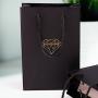 Handmade high quality guarantee gold stamping paper gift packaging bag with custom logo and handles