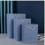 Customized Hot Selling Reusable Pattern Printed Paper Gift Bag Packaging With Handle
