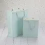 Sacs en papier assortis faits à la main, portables, abordables, pour emballage cadeaux d’étudiants avec design et logo personnalisés. Sacs en papier assortis faits à la main, portables, abordables, pour emballage cadeaux d’étudiants avec design et logo personnalisés.
