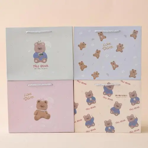 Hot Selling Universal Handmade Custom Printed Logo Paper Gift Packaging Bags With Handles Hot Selling Universal Handmade Custom Printed Logo Paper Gift Packaging Bags With Handles