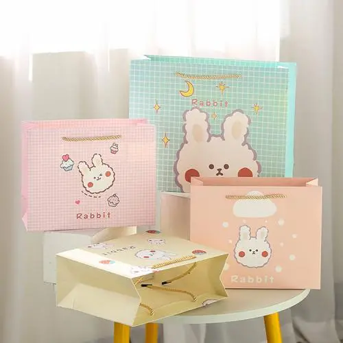 New Design Custom Logo Rectangular Lovely Cute Paper Gift Bags Packaging With Handles New Design Custom Logo Rectangular Lovely Cute Paper Gift Bags Packaging With Handles