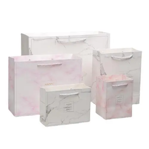 Sacs d'emballage en papier imprimés de différentes tailles, personnalisés, de haute qualité et respectueux de l'environnement. Sacs d'emballage en papier imprimés de différentes tailles, personnalisés, de haute qualité et respectueux de l'environnement.