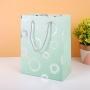 Wholesale Custom High Quality Ivory Board Handle Simple Paper Gift Bags Packaging For Shopping