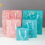 Good Quality Easy Shipping Delicate Environmental Paper Gift Packaging Bags With Ribbon Tie Handle