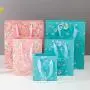 Good Quality Easy Shipping Delicate Environmental Paper Gift Packaging Bags With Ribbon Tie Handle