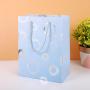 Wholesale Custom High Quality Ivory Board Handle Simple Paper Gift Bags Packaging For Shopping