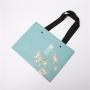 Wholesale Custom Luxury Gift Garment Paper Shopping Bags With Fancy Print