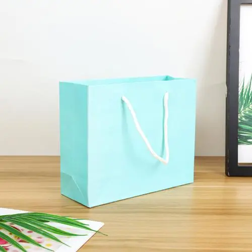 Wholesale Color Printed Recommended Luxury Paper Gift Bags Packaging With Handle Wholesale Color Printed Recommended Luxury Paper Gift Bags Packaging With Handle