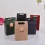 Hochwertige, preisgünstige, handgemachte Kraftpapier-Geschenktüten für Verpackungen mit individuellem Design und Logo