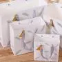 Großhandel Maßgeschneiderte Logo-Druck Wiederverwendbare Tragbare Papier Geschenkpapiertüten