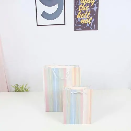 Wholesale Simple Types Delicate Style Fancy Paper Party Gift Packaging Bag With Custom Logo Wholesale Simple Types Delicate Style Fancy Paper Party Gift Packaging Bag With Custom Logo