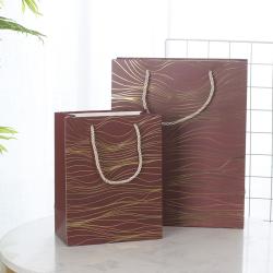 Wholesale Simple Delicate Gold Stamping Printed Paper Gift Packaging Bag With Custom Design Logo