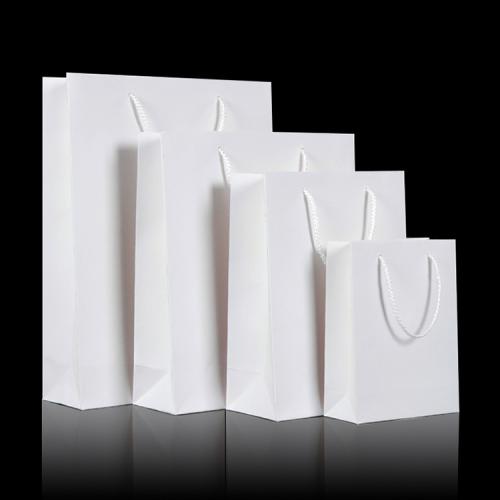 High Quality Eco-friendly Recycled Kraft Gift Paper Garment Bags For Packaging Clothing With Custom Logo