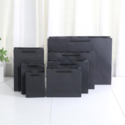 Wholesale Eco-friendly Alternative Kraft Paper Gift Bag Clothes Shopping Paper Garment Bags With Custom Logo