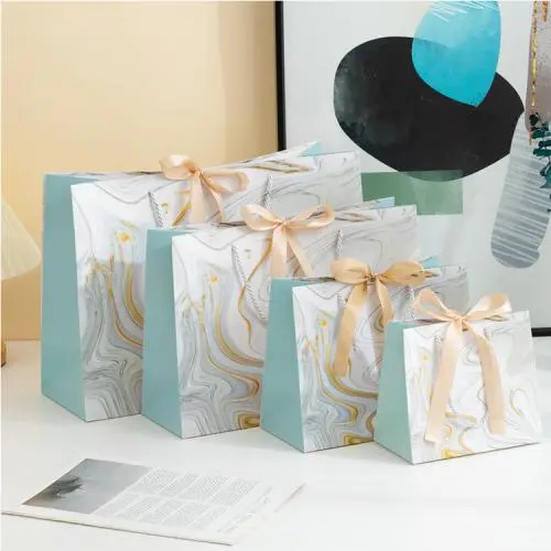 Wholesale Hot Selling Reasonable Good Quality Paper Bags Gift Packaging With Ribbon Tie Handle Wholesale Hot Selling Reasonable Good Quality Paper Bags Gift Packaging With Ribbon Tie Handle