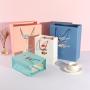 Wholesale Small Cute Colorful Printing Cartoon Paper Bags Gift Packaging With Handles