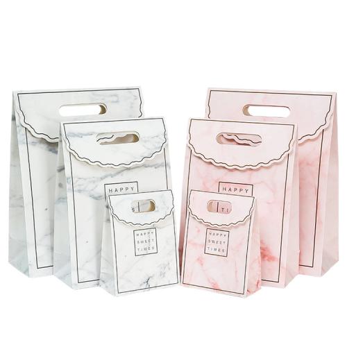 Hot Selling High Quality Reusable Luxury Portable Paper Gift Packaging Bag With Custom Own Logo