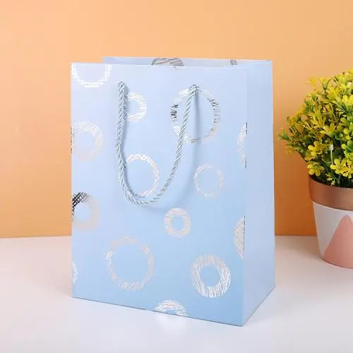 Wholesale Custom High Quality Ivory Board Handle Simple Paper Gift Bags Packaging For Shopping Wholesale Custom High Quality Ivory Board Handle Simple Paper Gift Bags Packaging For Shopping