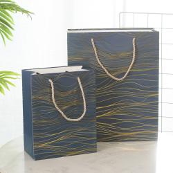 Wholesale Simple Delicate Gold Stamping Printed Paper Gift Packaging Bag With Custom Design Logo
