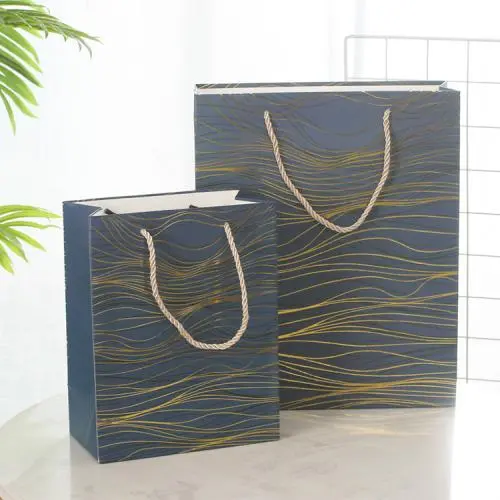 Wholesale Simple Delicate Gold Stamping Printed Paper Gift Packaging Bag With Custom Design Logo Wholesale Simple Delicate Gold Stamping Printed Paper Gift Packaging Bag With Custom Design Logo