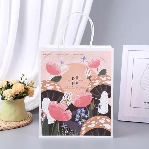 2021 Maßgeschneiderte Griff-Boutique-Geschenkpapier-Taschen mit Logo